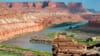 Fort Bottom Ruin overlooks the Green River, with red rock cliffs rising in the background in Canyonlands National Park, Utah.